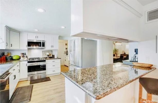 Chandelier, Interior, Kitchen, Recessed Lighting, Stainless Steel Appliances, Wood Texture Flooring