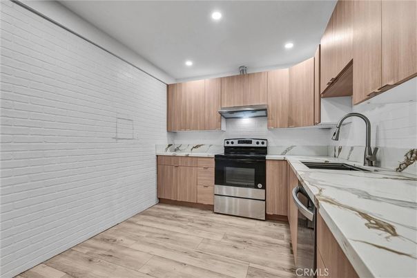 Interior, Kitchen, Recessed Lighting, Stainless Steel Appliances, Wood Texture Flooring