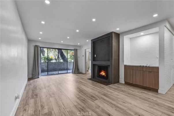 Empty room, Fireplace, Interior, Recessed Lighting, Wood Texture Flooring