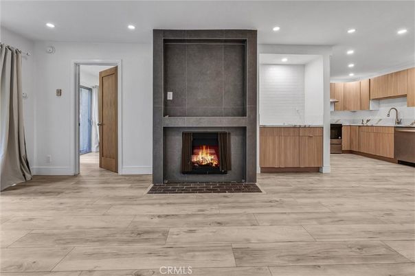 Fireplace, Interior, Kitchen, Recessed Lighting, Wood Texture Flooring