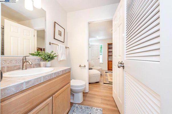 Bathroom, Interior, Recessed Lighting, Tile Countertops, Wood Texture Flooring