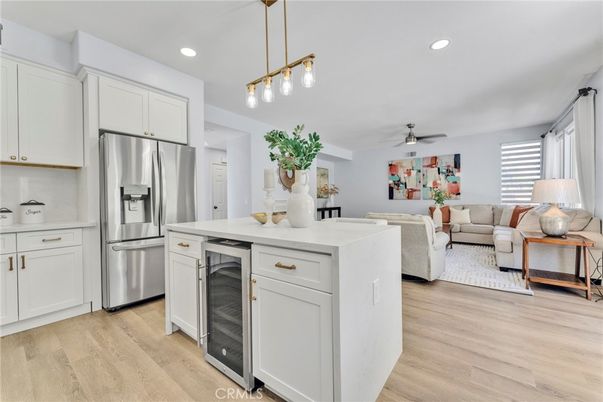 Dining room, Interior, Kitchen, Living room, Pendant Lights, Recessed Lighting, Stainless Steel Appliances, Wood Texture Flooring