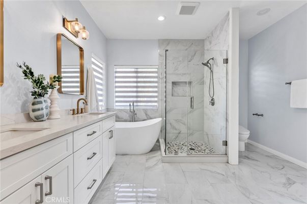 Bathroom, Dual Sink Vanities, Free Standing Baths, Glass Shower, Interior, Marble, Marble Walls, Recessed Lighting