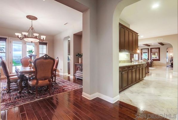 Chandelier, Dining room, Interior, Marble, Recessed Lighting, Wood Texture Flooring