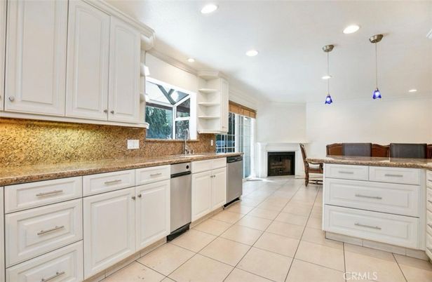 Fireplace, Interior, Kitchen, Pendant Lights, Recessed Lighting, Stainless Steel Appliances