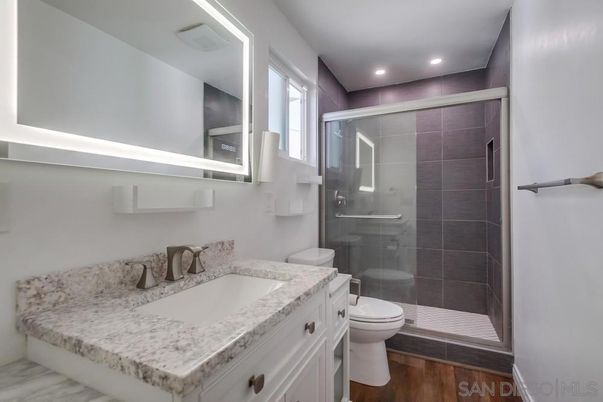 Bathroom, Glass Shower, Interior, Recessed Lighting, Wood Texture Flooring