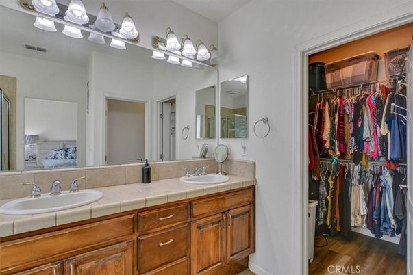 Bathroom, Dual Sink Vanities, Interior, Tile Countertops, Walk-in Closets, Wood Texture Flooring