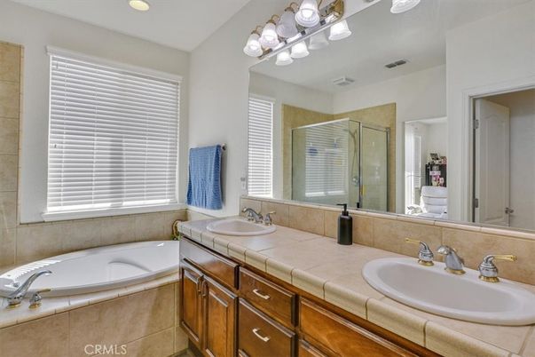 Bathroom, Dual Sink Vanities, Glass Shower, Interior, Recessed Lighting, Tile Countertops