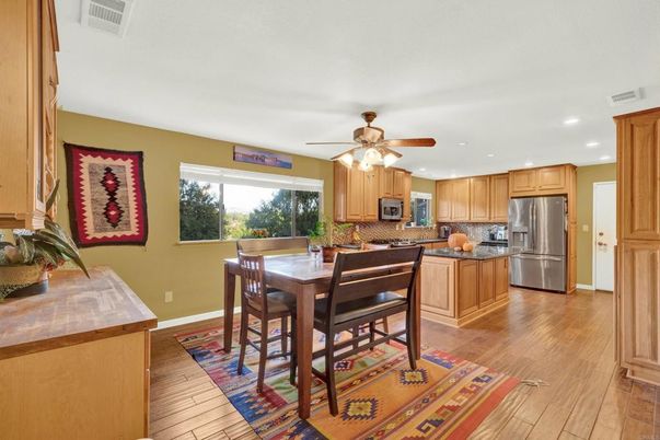 Dining room, Interior, Kitchen, Recessed Lighting, Stainless Steel Appliances, Wood Texture Flooring