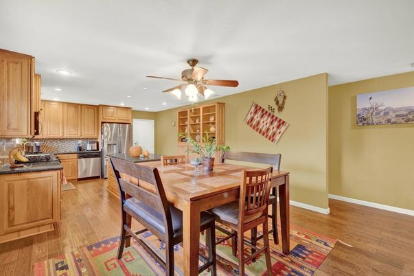 Dining room, Interior, Kitchen, Recessed Lighting, Stainless Steel Appliances, Wood Texture Flooring