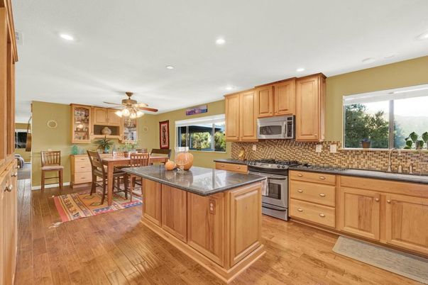 Dining room, Interior, Kitchen, Recessed Lighting, Stainless Steel Appliances, Wood Texture Flooring