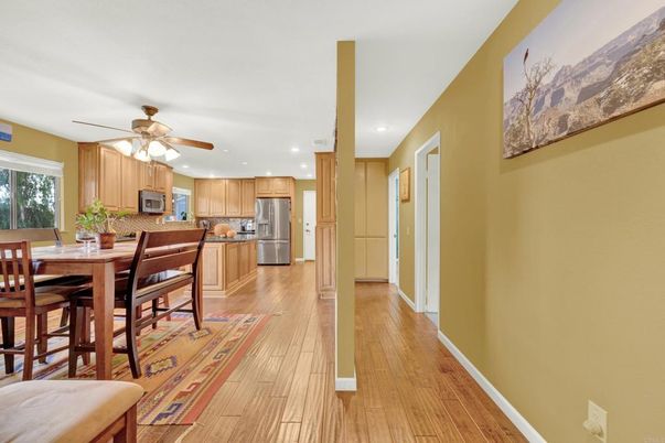Dining room, Interior, Kitchen, Recessed Lighting, Stainless Steel Appliances, Wood Texture Flooring