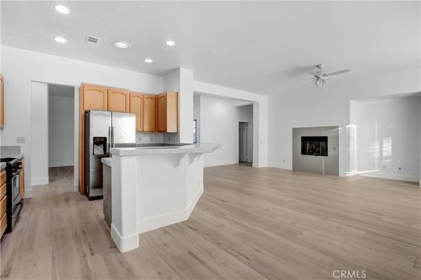 Fireplace, Interior, Kitchen, Recessed Lighting, Wood Texture Flooring