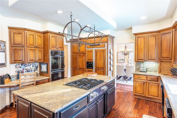 Chandelier, Dining room, Interior, Kitchen, Recessed Lighting, Stainless Steel Appliances, Wood Texture Flooring