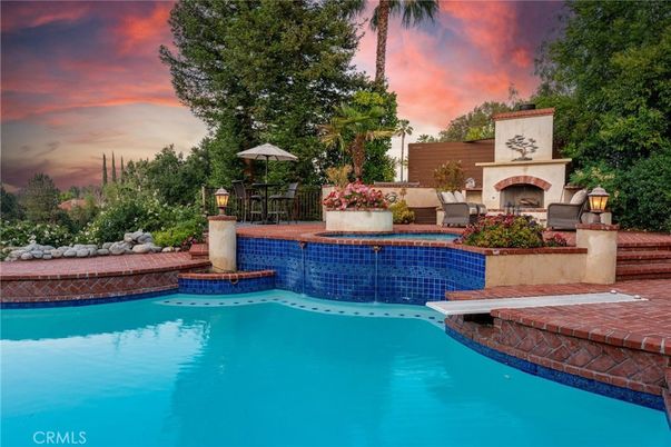 Exterior, Fireplace, Pool