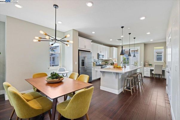 Dining room, Interior, Kitchen, Pendant Lights, Recessed Lighting, Stainless Steel Appliances, Wood Texture Flooring