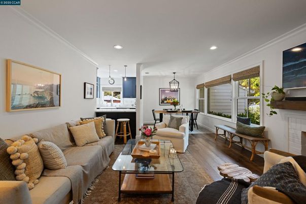 Dining room, Fireplace, Interior, Living room, Pendant Lights, Recessed Lighting, Wood Texture Flooring