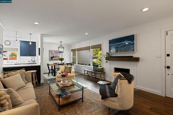 Dining room, Fireplace, Interior, Living room, Pendant Lights, Recessed Lighting, Wood Texture Flooring