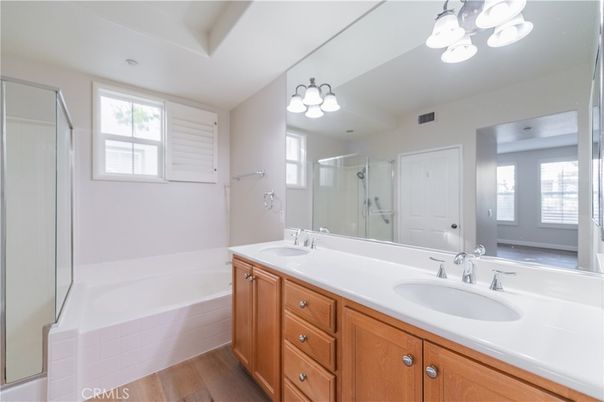 Bathroom, Dual Sink Vanities, Glass Shower, Interior, Wood Texture Flooring