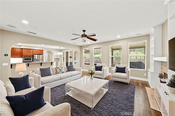 Fireplace, Interior, Kitchen, Living room, Pendant Lights, Recessed Lighting, Stainless Steel Appliances, Wood Texture Flooring