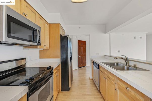 Interior, Kitchen, Tile Countertops, Wood Texture Flooring