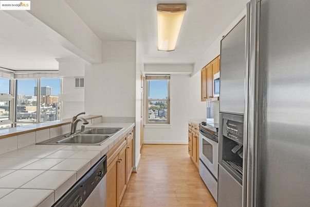 Interior, Kitchen, Stainless Steel Appliances, Tile Countertops, Wood Texture Flooring