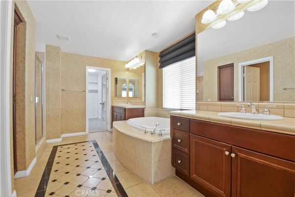 Bathroom, Dual Sink Vanities, Glass Shower, Interior, Recessed Lighting, Tile Countertops