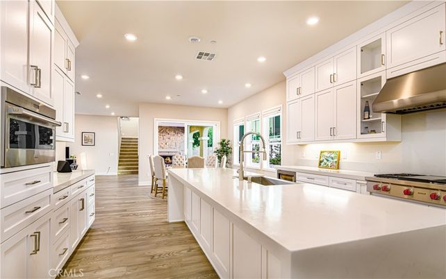 Dining room, Interior, Kitchen, Recessed Lighting, Stainless Steel Appliances, Wood Texture Flooring