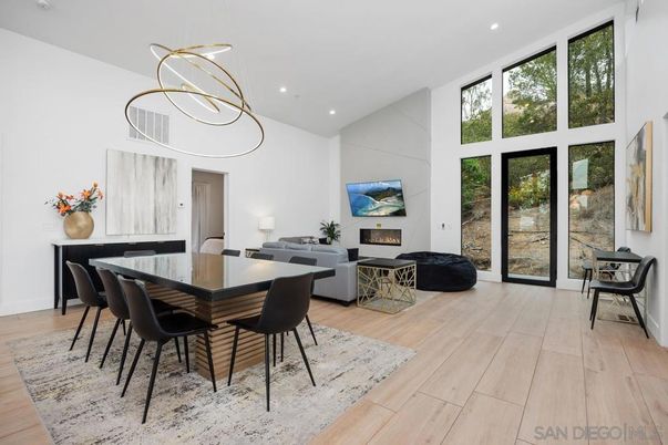 Dining room, Fireplace, Interior, Living room, Pendant Lights, Recessed Lighting, Wood Texture Flooring