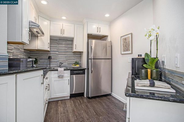 Interior, Kitchen, Recessed Lighting, Stainless Steel Appliances, Wood Texture Flooring