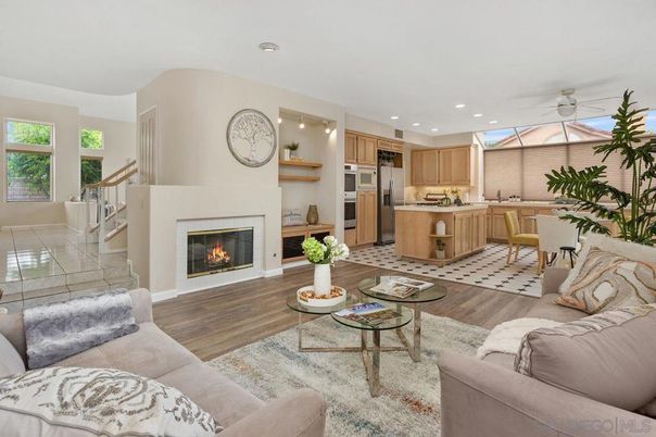 Dining room, Fireplace, Interior, Kitchen, Living room, Recessed Lighting, Stainless Steel Appliances, Wood Texture Flooring