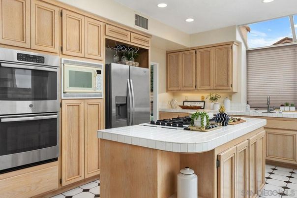 Interior, Kitchen, Recessed Lighting, Stainless Steel Appliances, Tile Countertops