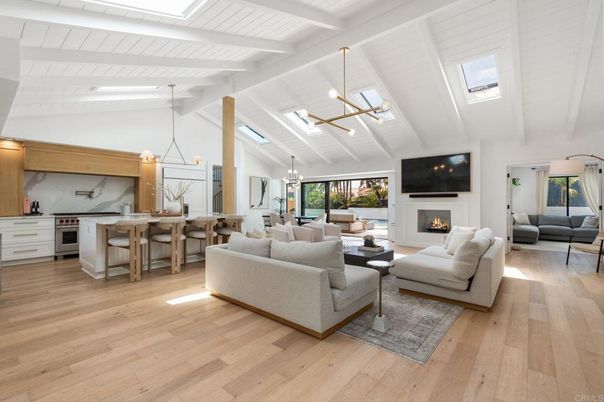 Dining room, Fireplace, Interior, Kitchen, Living room, Marble Walls, Pendant Lights, Wood Texture Flooring