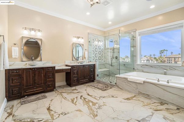 Bathroom, Dual Sink Vanities, Glass Shower, Interior, Marble, Marble Walls, Recessed Lighting