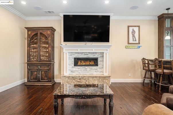 Fireplace, Interior, Recessed Lighting, Wood Texture Flooring