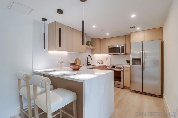 Interior, Kitchen, Pendant Lights, Recessed Lighting, Stainless Steel Appliances, Wood Texture Flooring
