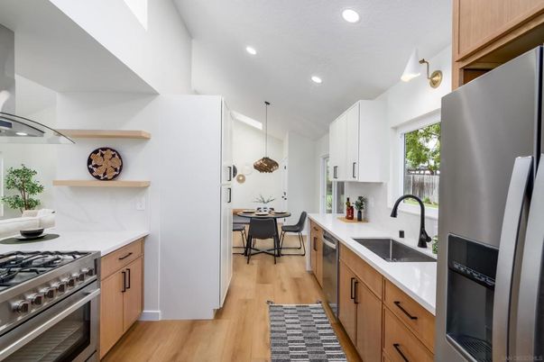 Dining room, Interior, Kitchen, Pendant Lights, Recessed Lighting, Stainless Steel Appliances, Wood Texture Flooring