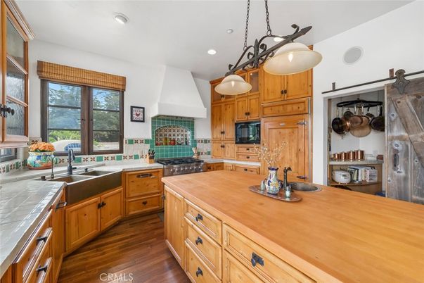 Interior, Kitchen, Pendant Lights, Recessed Lighting, Tile Countertops, Wood Texture Flooring