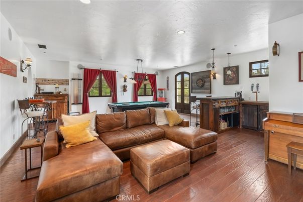 Billiard Table, Game Room, Interior, Living room, Pendant Lights, Recessed Lighting, Wood Texture Flooring
