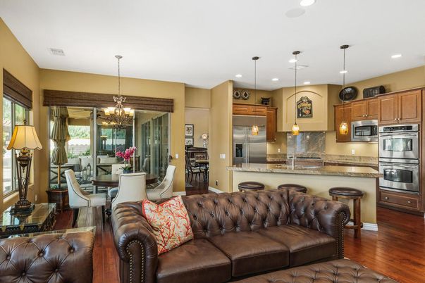 Chandelier, Dining room, Interior, Kitchen, Pendant Lights, Recessed Lighting, Stainless Steel Appliances, Wood Texture Flooring