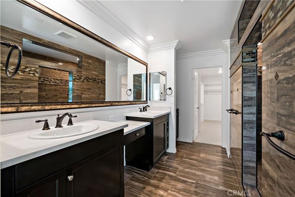 Bathroom, Dual Sink Vanities, Interior, Recessed Lighting, Wood Texture Flooring