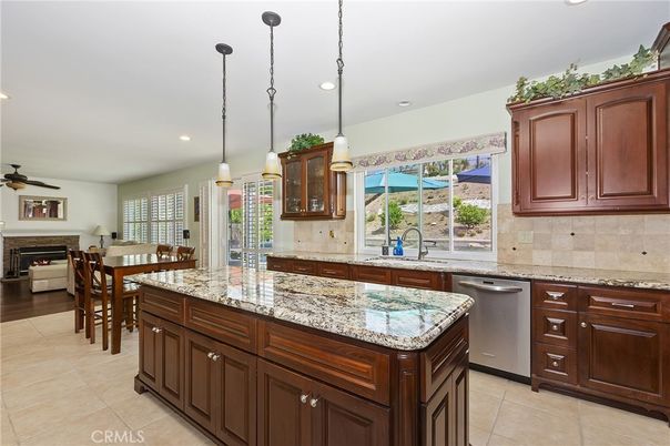 Dining room, Fireplace, Interior, Kitchen, Living room, Pendant Lights, Recessed Lighting, Stainless Steel Appliances