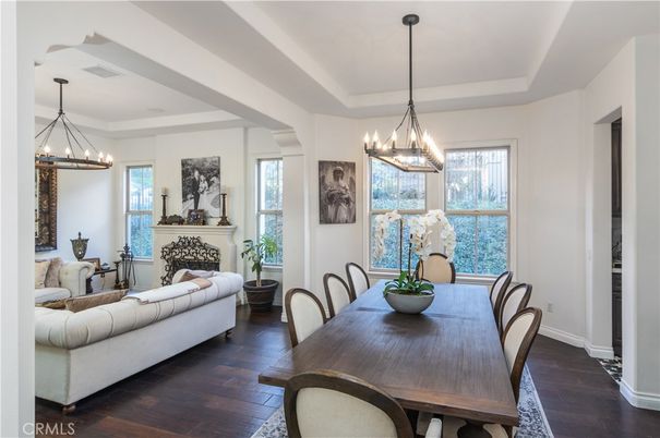 Chandelier, Dining room, Fireplace, Interior, Living room, Pendant Lights, Wood Texture Flooring