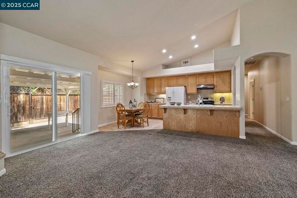 Chandelier, Dining room, Interior, Kitchen, Pendant Lights, Recessed Lighting, Stainless Steel Appliances