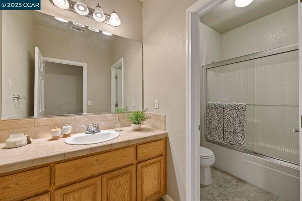 Bathroom, Dual Sink Vanities, Glass Shower, Interior, Tile Countertops
