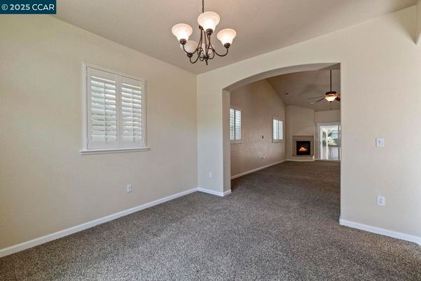 Chandelier, Empty room, Fireplace, Interior