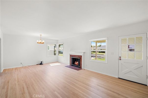 Chandelier, Empty room, Fireplace, Interior, Wood Texture Flooring