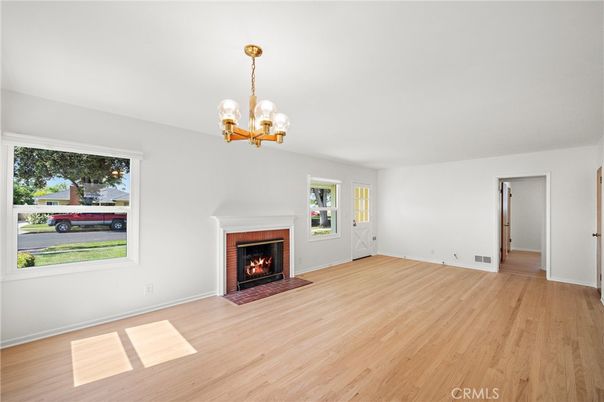 Chandelier, Empty room, Fireplace, Interior, Wood Texture Flooring