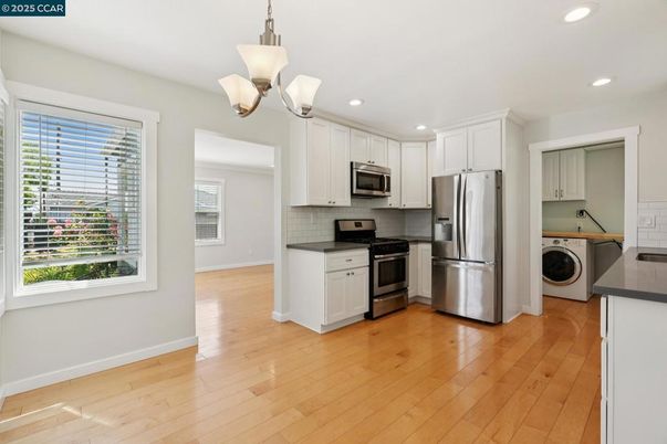 Interior, Kitchen, Pendant Lights, Recessed Lighting, Stainless Steel Appliances, Washer, Wood Texture Flooring