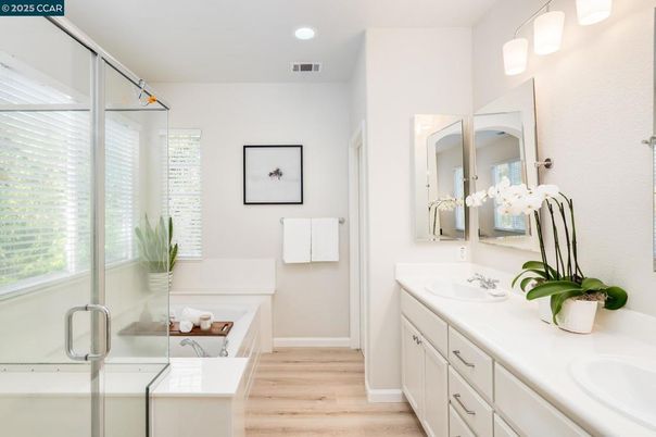 Bathroom, Dual Sink Vanities, Glass Shower, Interior, Recessed Lighting, Wood Texture Flooring